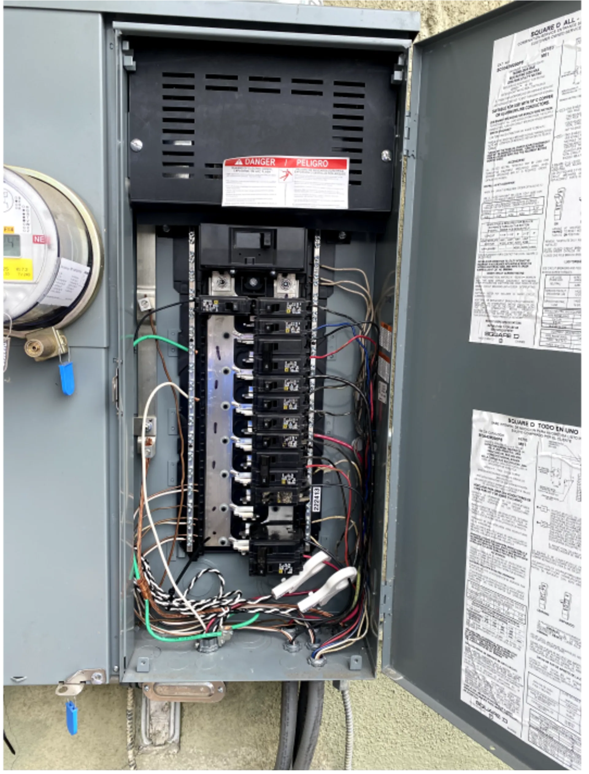 Open residential main electrical panel installed by EL-FI Homes