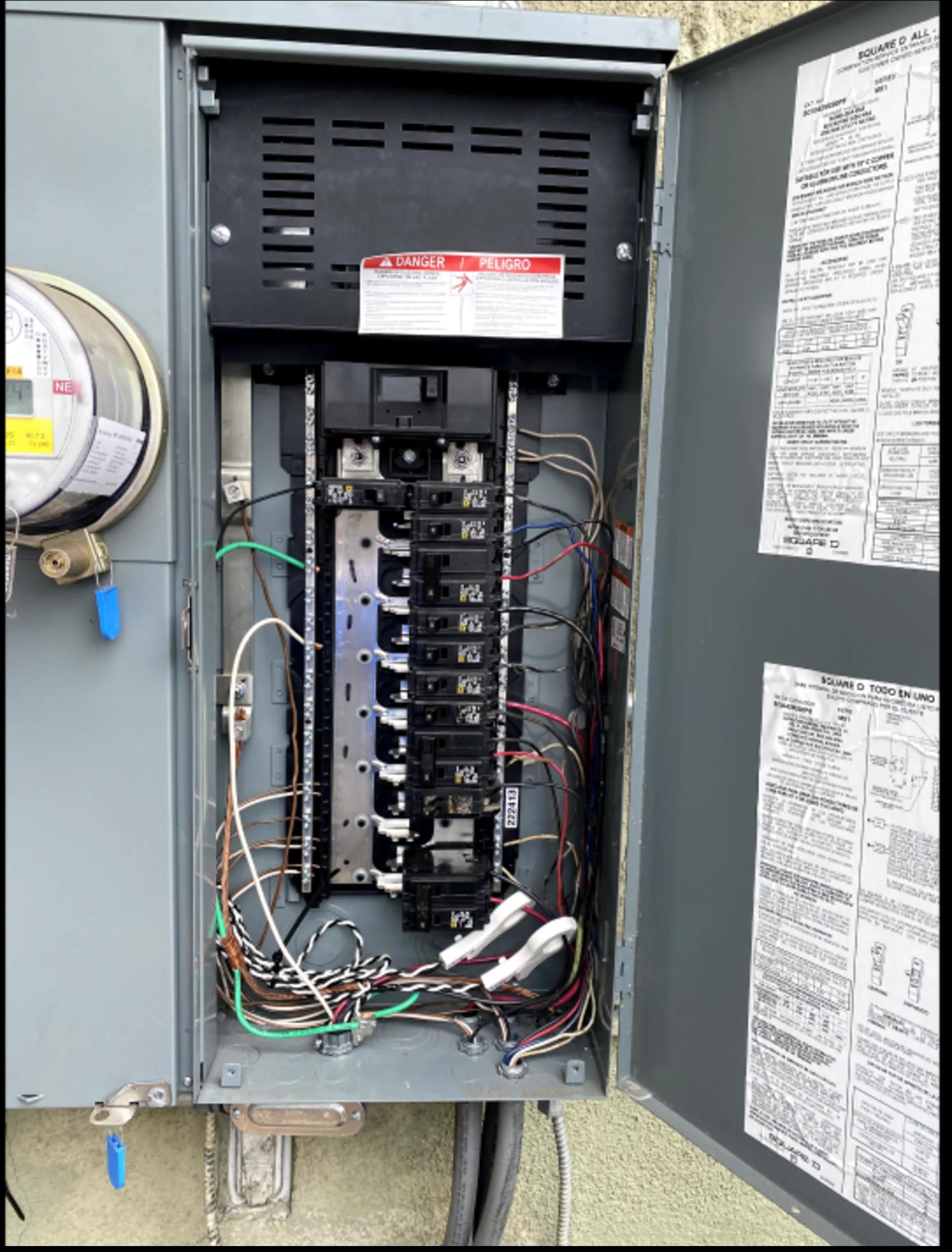 Open residential main electrical panel installed by EL-FI Homes