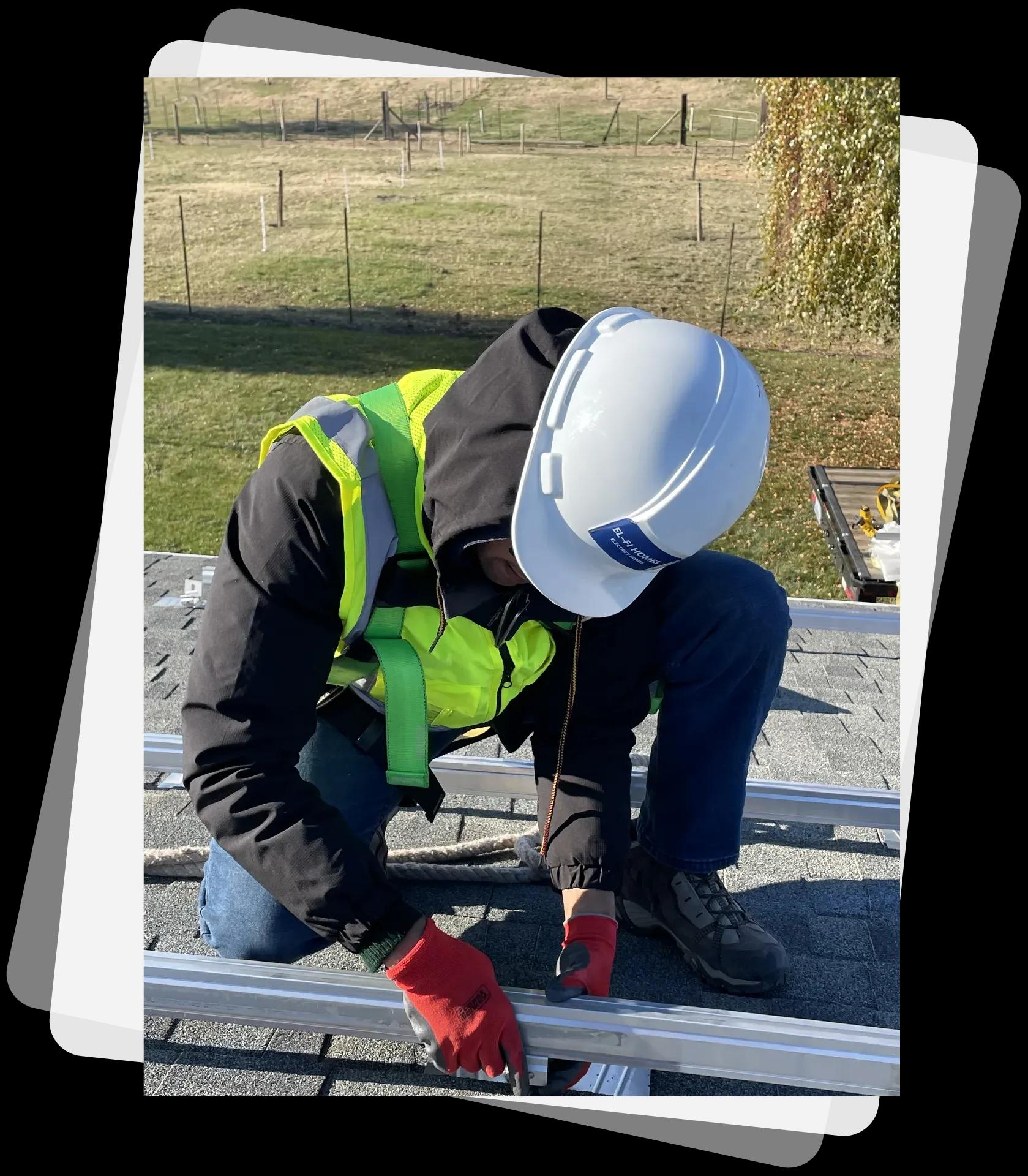 EL-FI Homes technician working on rooftop equipment